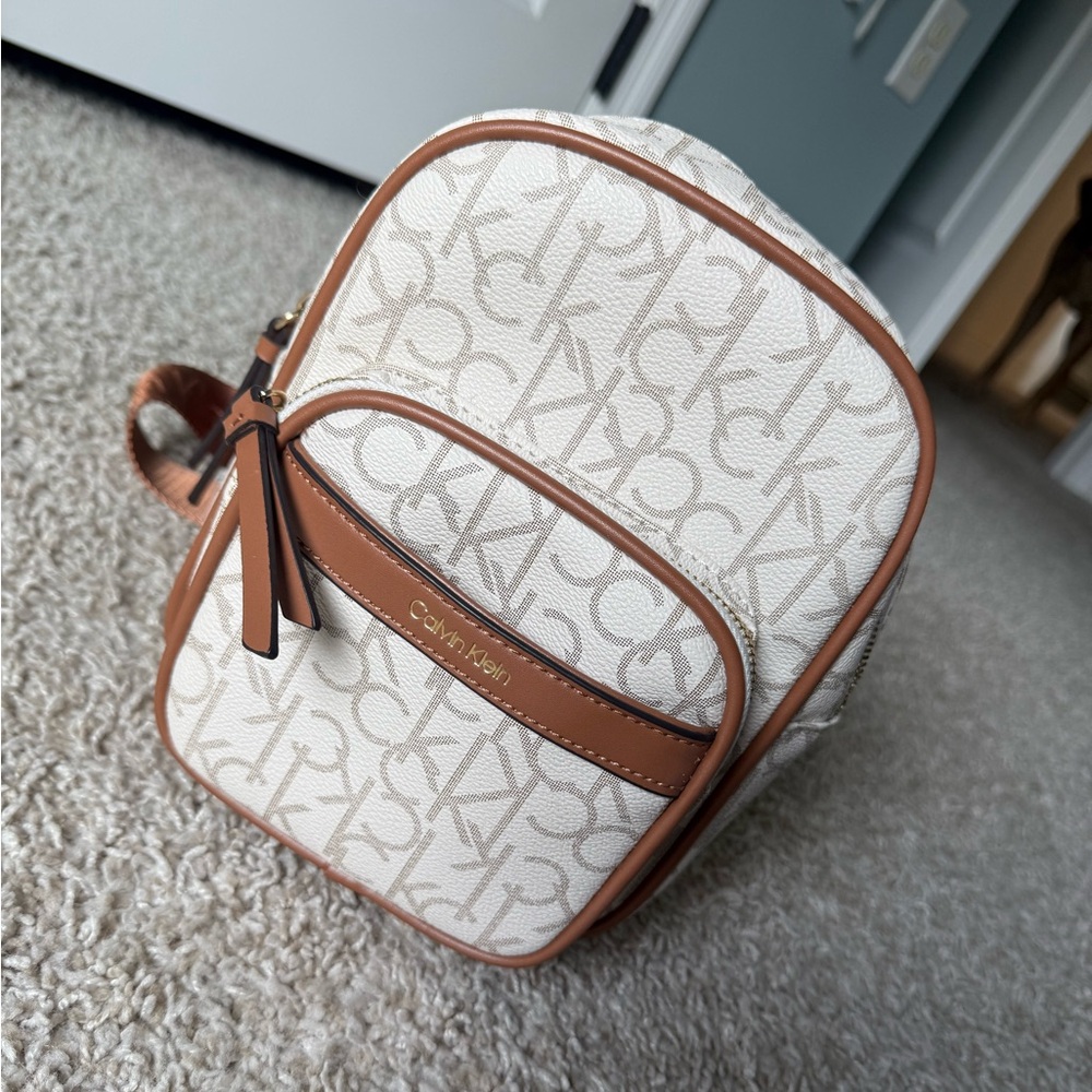 Calvin Klein Cream Monogram Mini Backpack with Brown Trim